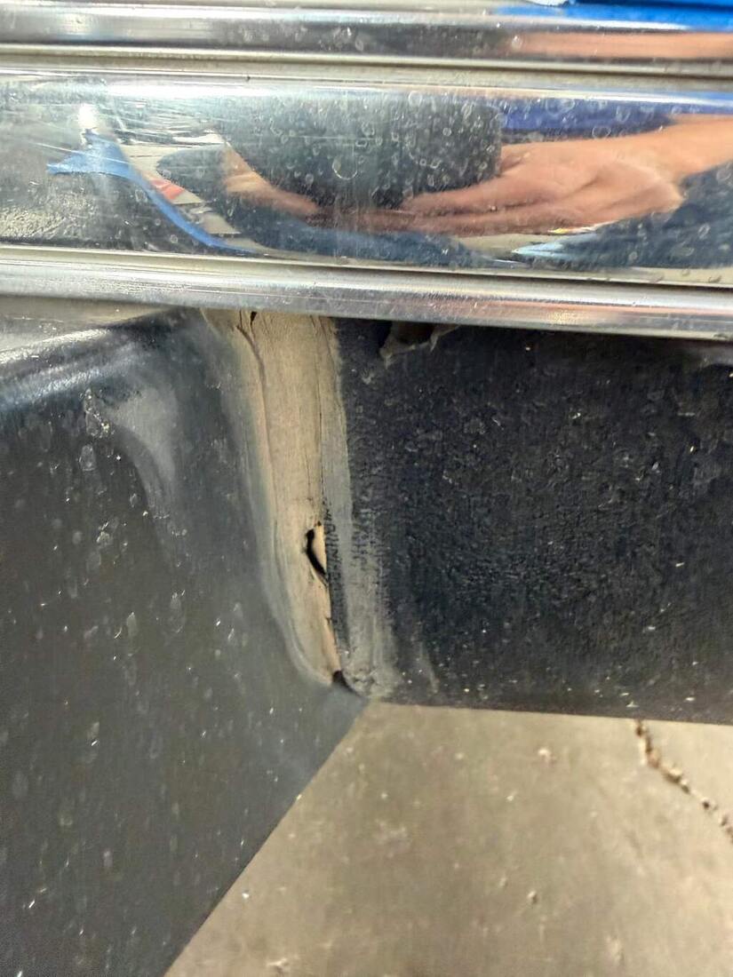 Compartment opening showing the affected area